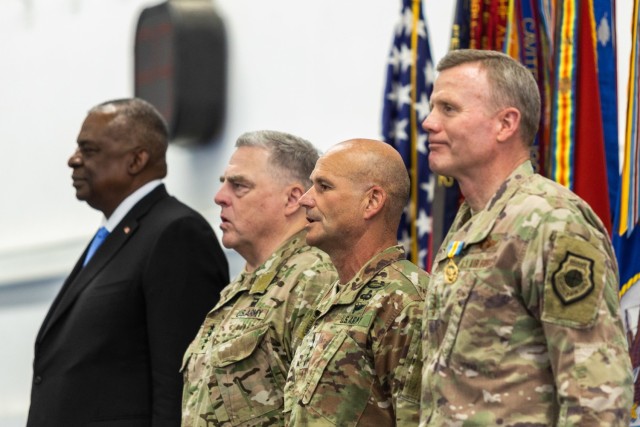 (From Left to Right) U.S. Secretary of Defense Lloyd J. Austin III, U.S. Chairman of the Joint Chiefs of Staff General Mark A. Milley, U.S. Army Gen. Christopher G. Cavoli and U.S. Air Force Gen. Tod D. Wolters stand at attention for the playing of the Armed Forces Medley during a change of command ceremony for U.S. European Command in Stuttgart, Germany, on July 1, 2022. Upon taking command from Wolters, Cavoli assumed responsibility for U.S. military operations across Europe, portions of Asia and the Middle East, the Arctic and Atlantic Ocean. USEUCOM is comprised of more than 64,000 permanently assigned military and civilian personnel and works closely with NATO Allies and Partners.
