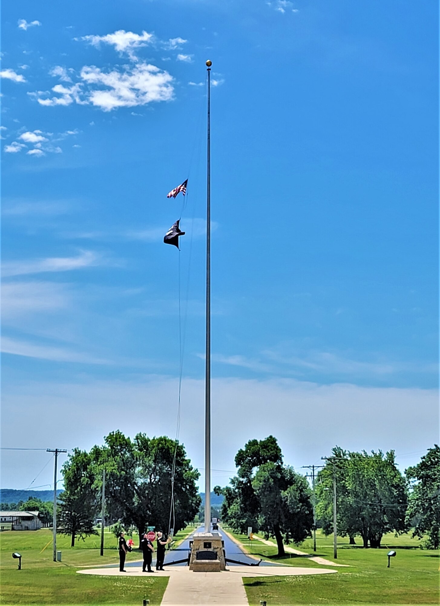 Photo Essay: Fort McCoy police fly special flag for department ...