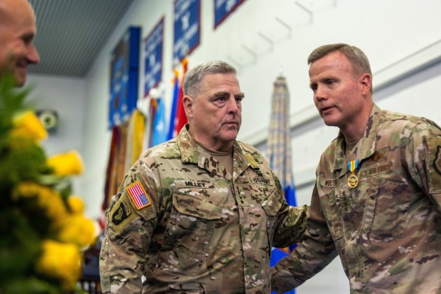 U.S. Chairman of the Joint Chiefs of Staff General Mark A. Milley speaks with U.S. Air Force Gen. Tod D. Wolters during a change of command ceremony for U.S. European Command in Stuttgart, Germany, on July 1, 2022. Upon taking command from Wolters, U.S. Army Gen. Christopher G. Cavoli assumed responsibility for U.S. military operations across Europe, portions of Asia and the Middle East, the Arctic and Atlantic Ocean. USEUCOM is comprised of more than 64,000 permanently assigned military and civilian personnel and works closely with NATO Allies and Partners.