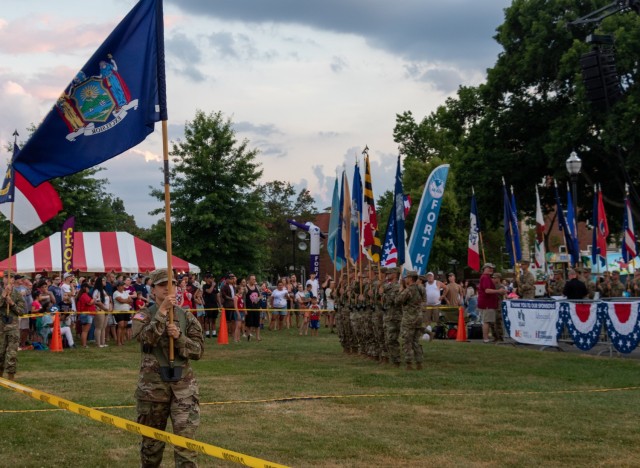 Newly-commissioned second lieutenants carry out the state’s flags in the order they joined the Union during the Salute to the Nation ceremony at the July 4, 2022 Fort Knox Independence Day celebration.