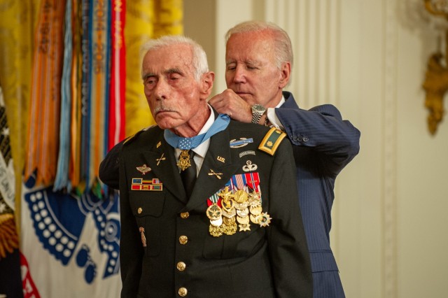 Retired Maj. John Duffy receives the Medal of Honor from the president Joe Biden at the White House on July 5, 2022. Duffy distinguished himself by acts of gallantry and intrepidity above and beyond the call of duty, while serving as the senior advisor to the 11th Airborne Battalion, 2d Brigade, Airborne Division, Army of the Republic of Vietnam in the Republic of Vietnam, during the period of April 14 -15, 1972. Duffy was awarded the Distinguished Service Cross for his actions on Dec. 1, 1972. On April 16, 2018, the Secretary of the Army recommended upgrade of his award to the Medal of Honor. (U.S. Army photo by Sgt. Henry Villarama)