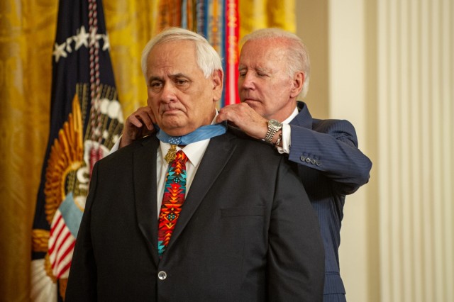 Former Spc. 5 Dwight Birdwell receives the Medal of Honor from the President Joe Biden at the White House on July 5, 2022.  Birdwell distinguished himself by acts of gallantry and intrepidity above and beyond the call of duty while serving with Troop C, 3d Squadron, 4th Cavalry, 25th Infantry Division in the Republic of Vietnam on Jan. 31, 1968. For his actions on that day, then Spc. 5 Birdwell was awarded the Silver Star. On Oct. 22, 2019, the Secretary of the Army recommended upgrade of his award to the Medal of Honor. (U.S. Army photo by Sgt. Henry Villarama)