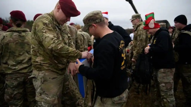 Soldiers collect toys for host nation children at GTA march