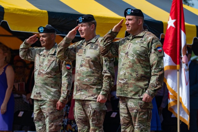 Incoming U.S. Army Forces Command Commanding General, Gen. Andrew P. Poppas, U.S. Army Chief of Staff, Gen. James C. McConville, and outgoing FORSCOM commander, Gen. Michael X. Garret, render honors to the flag during the FORSCOM Change of Command Ceremony.