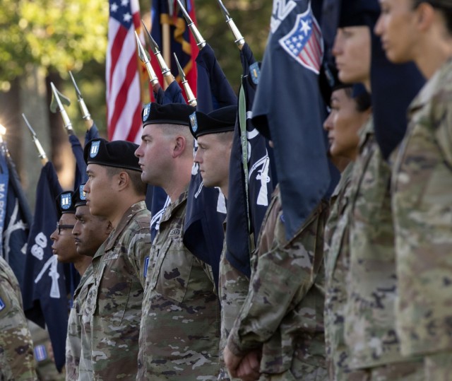 Company commanders in the 193rd Infantry Brigade watch as Col. Scott C. White takes over the unit's reins from Col. Mark Huhtanen in a change of command ceremony on Fort Jackson June 30, 2022.
