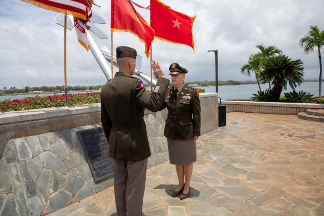 Brig. Gen. Holler administers the oath of office to Caroline Surprenant on her promotion to CW5