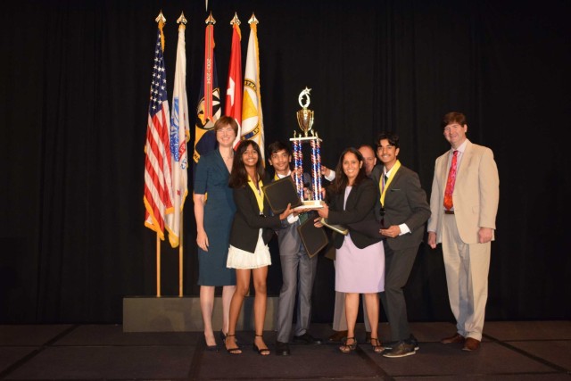 The eighth grade winning team is OMg from Granger Middle School in Aurora, Illinois. The team studied the impact of different soil additives on increasing the magnesium content in food crops and determined a cost-effective and eco-friendly solution. The team is comprised of students NidhiSagaram, Samil Sharma, and Viraj Vyas and led by Team Advisor Aruna Rao. 