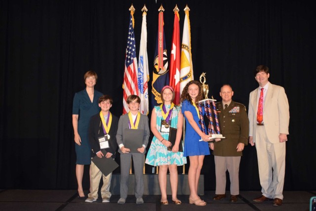 The sixth grade team winning team is Oh, Deer! from St. Richard Catholic School in Jackson, Mississippi. The team created a device, the Steer Deer Clear, to prevent deer-vehicle accidents by producing variable light and sound signals that deter deer from approaching the road. Oh, Deer! team members include Benjamin Manhein, Neel Boteler, Maley Thornhill and Lily Frances Garner and led by Team Advisor Ashley Klein.  
