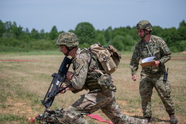 Spc. Nathaniel Miska, a carpentry and masonry specialist with the 850th Engineer Company, Minnesota National Guard, participates in weapons qualification during the Croatian Best Soldier Competition in May 2022 near Slunj, Croatia. Croatia and Minnesota have worked together for 26 years as part of the Department of Defense National Guard Bureau State Partnership Program. (Minnesota National Guard photo by Staff Sgt. Sydney Mariette)