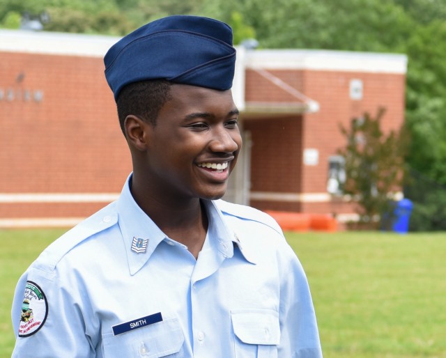 Caleb Smith, a Charles H. Flowers High School student, smiles after an orientation flight flown by the 1st Helicopter Squadron assigned to Joint Base Andrews, Md., June 7, 2022. The Air Force District of Washington Commander, Maj. Gen. Joel Jackson, recognized Smith for his academic and aviation achievements. Smith is the nation’s youngest pilot to earn a private glider pilot license, and is continuing to pursue his private pilot license.