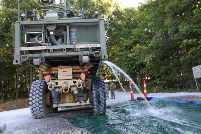 Soldiers from units within the 149th Maneuver Enhancement Brigade began transporting water from the Trade Water River to Old City Lake, near Marion. Army Palletized Load System (PLS) vehicles transported non-potable storage tanks daily with the...