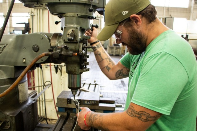 Personal challenges don’t deter graduation for RIA-JMTC machinist apprentice