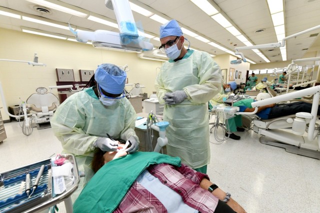 Dental students practice their skills while treating Soldiers, dependents, retirees | Article