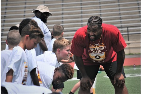 NFL Football star spends time with kids at Fort Lee ProCamp