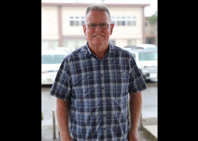 Kim McCann, who serves as the physical security manager at Kure Pier 6 in Japan, poses for a photograph. The 66-year-old Army civilian recently led a weeklong summer camp at Marine Corps Air Station Iwakuni, which had about 200 American scouts...