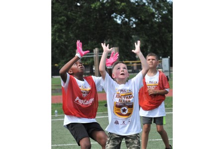 Overview - Jonathan Allen Football Camp with members of the