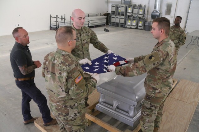 The Virginia National Guard Funeral Honors Program hosts Level 1 funeral honors training for nine National Guard Soldiers from four states June 29, 2022, at the State Military Reservation in Virginia Beach, Va. Soldiers from Maryland, North Carolina and Ohio joined Virginia Soldiers for the five-day course, which prepares Soldiers to conduct professional military funeral honors in accordance with service tradition. (A.J. Coyne)
