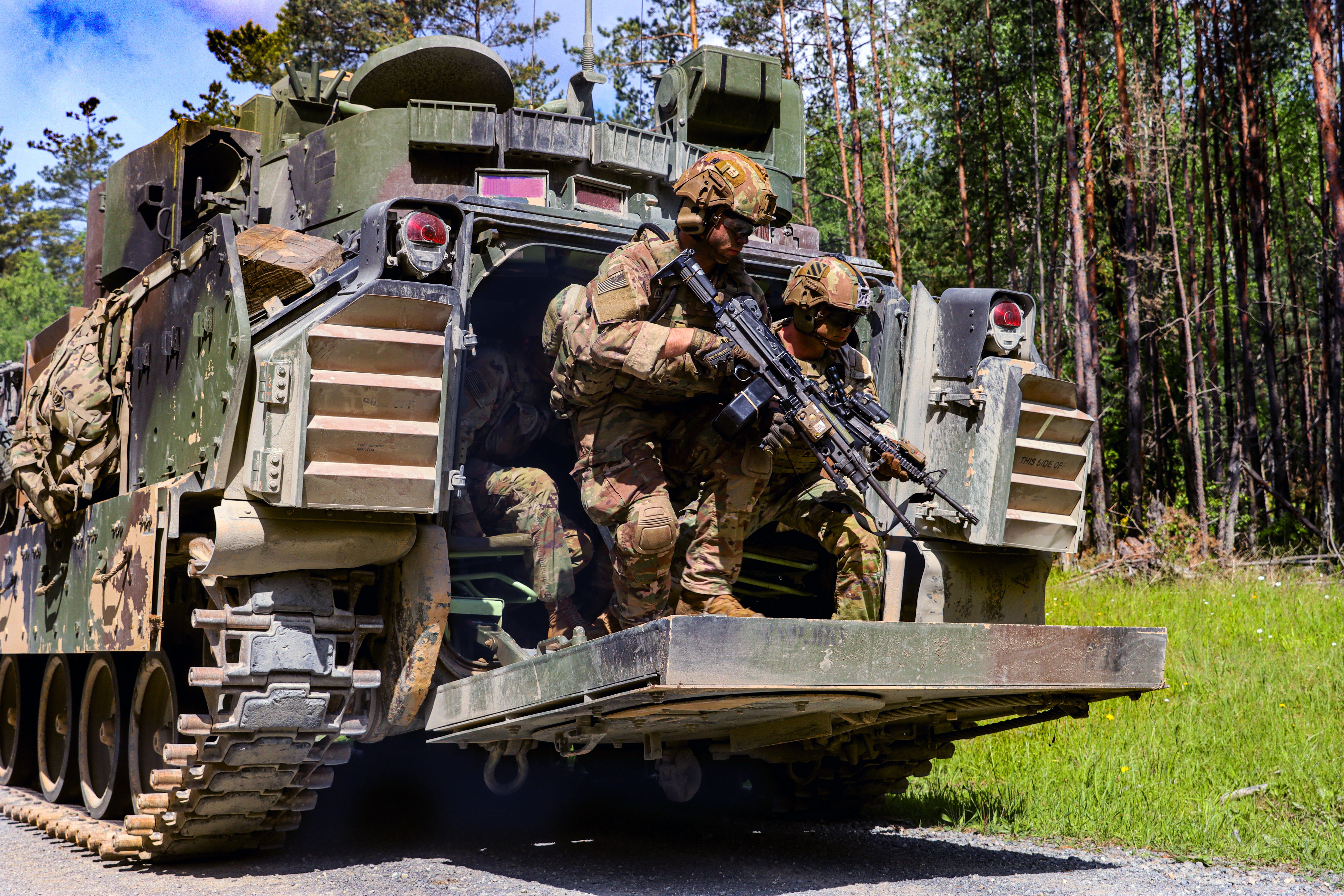 Soldiers assigned to the 7th Infantry Regiment conduct live-fire exercises at the Grafenwoehr Training Area in Germany, May 22, 2022.