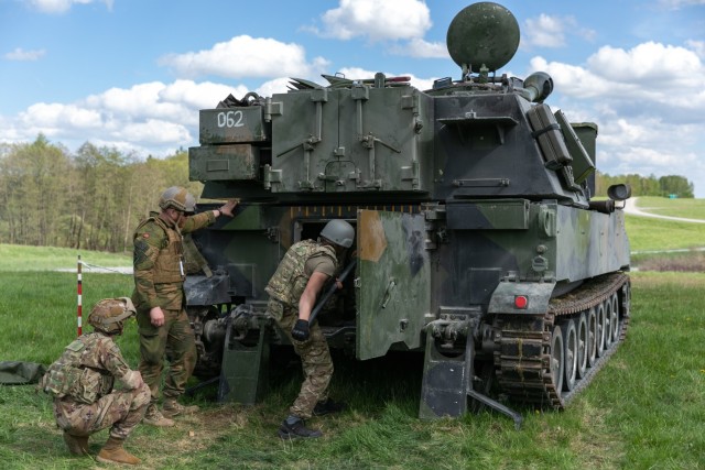 Ukrainian artillerymen load an M109 self-propelled howitzer, during training at Grafenwoehr Training Area, May 12, 2022. Soldiers from the U.S. and Norway trained Armed Forces of Ukraine artillerymen on the howitzers as part of security assistance packages from their respective countries.