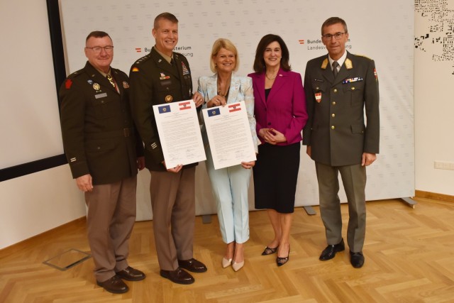 Left to right, U.S. Army Maj. Gen. Gregory Knight, Vermont’s adjutant general; U.S. Army Gen. Daniel Hokanson, chief, National Guard Bureau; Klaudia Tanner, federal minister of defense of the Republic of Austria; U.S. Ambassador to Austria Victoria Kennedy; Lt. Gen. Erich Csitkovits, training director and commandant, National Defence Academy, sign letters of intent between the Vermont National Guard and Republic of Austria July 19, 2022, Vienna, Austria. The Vermont National Guard also has partnerships with North Macedonia, since 1993, and Senegal, since 2008.  (U.S. Army National Guard Photo by 1st Lt. Nathan Rivard)