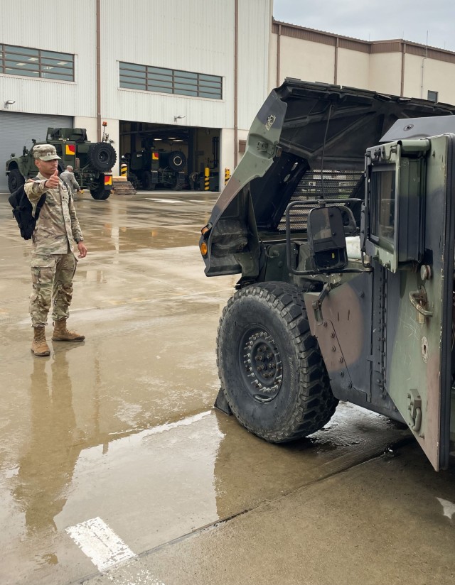 U.S. Army Cadet Charles Snead, assigned to 194th Division Sustainment Support Battalion, 2nd Infantry Division Sustainment Brigade, performs preventative maintenance checks and service to an Army Motor Vehicle at Camp Humphreys, South Korea, July 18, 2022. Snead is a member of the Kentucky National Guard. (U.S. Army photo by 2nd Lt. Douglas Urban)