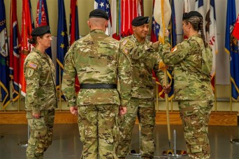 Colonel Darcy Saint-Amant relinquishes command to Colonel Julia Donley at 21st  Signal Brigade change of command ceremony