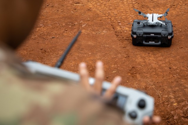 Sgt. Timothy Bella, a geospatial engineer assigned to 3rd Infantry Brigade Combat Team, 25th Infantry Division, prepares a Golden Eagle drone for flight during Exercise Bronco Rumble at the Kahuku Training Area, Hawaii on Aug. 19, 2021. The Golden...