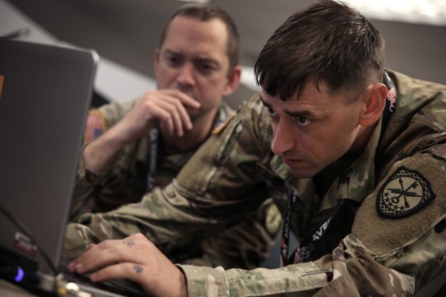 U.S. Cyber Command, Cyber National Mission Force members participate in a training and readiness exercise at Fort George G. Meade, Md., May 24, 2021. The CNMF plans, directs and synchronizes full-spectrum cyberspace operations to disrupt, degrade and defeat malicious cyber actors.