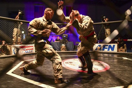 Soldiers participate in Fight Night, an annual combatives event, at Rose Barracks, Germany, May 24, 2022.