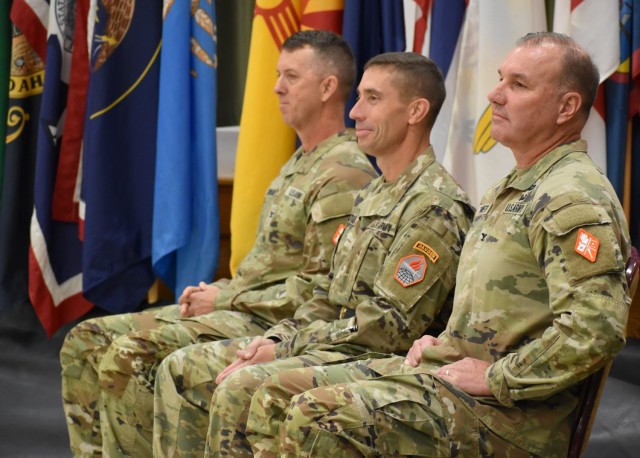 From left to right: Col. Paul D. Howard, U.S. Army Signal School commandant and 42nd Chief of Signal; Brig. Gen. Paul T. Stanton, Cyber Center of Excellence and Fort Gordon commanding general; and Col. James D. Turinetti IV, outgoing commandant and 41st Chief of Signal.