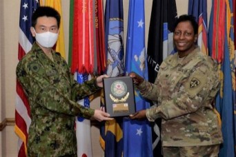 Col. Shawn Smart, White Sands Test Center Command meets with Col. Futoru Tanaka of the Japanese Self-Defense Forces for a gift exchange