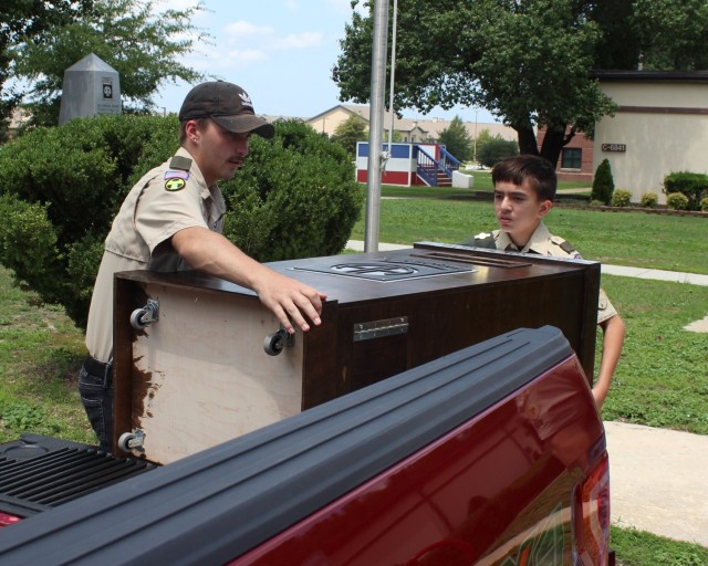 Scout provides a flag retirement box for 82nd Museum