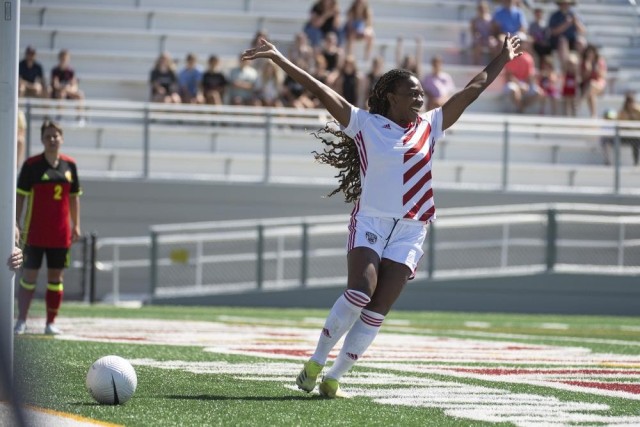 Army 1st Lt. Haley Roberson celebrates scoring her first of three goals, and the first of 10 for the U.S. Armed Forces Women’s Soccer Team against Belgium in the opening match of the 13th CISM (International Military Sports Council) World Military Women’s Football Championship in Meade, Washington July 11, 2022.