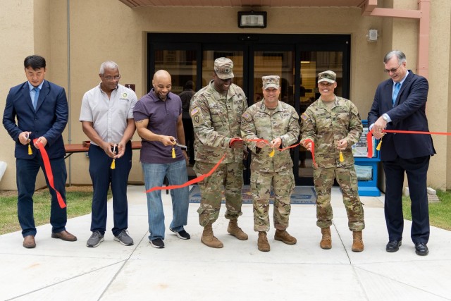 Representatives of U.S. Army Garrison Daegu and Far East District, U.S. Army Corps of Engineers cut the ribbon to officially open a new post office at Camp Carroll, Republic of Korea, August 1, 2022.

From left: Chon Y. Kim, Director of USAG Daegu&#39;s Directorate of Public Works; Gregory Williams, Camp Carroll Postal Officer; Shawn Burney, Postal Superintendent for Area IV; Lt. Col. Michael T. Pope, Deputy Commander of the Far East District, U.S. Army Corps of Engineers; Col. Brian P. Schoellhorn, USAG Daegu Commander; Sgt. Maj. Jonathon J. Blue, USAG Daegu Senior Enlisted Leader; Chester (Chet) Witkowski, USAG Daegu Deputy to the Garrison Commander