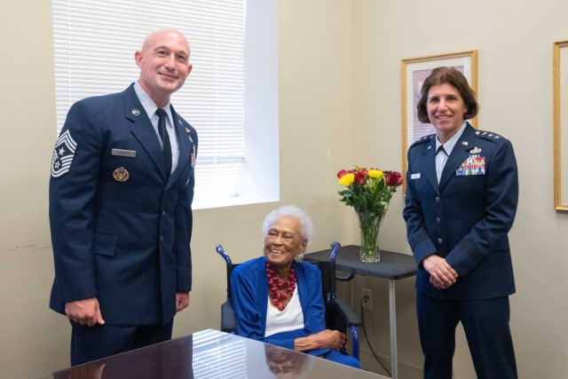 Chief Master Sgt. Stefan Blazier, Air University Command Chief Master Sergeant, and Lt. Gen. Andrea Tullos, Commander and President, Air University, pose with Congressional Gold Medal recipient Private Romay Catherine Johnson Davis at Montgomery City Hall, July 26, 2022.

President Joe Biden approved the Congressional Gold Medal presentation to the women of the 6888th Central Postal Directory Battalion, an all-female, all-African American unit that resolved a backlog of more than 17 million pieces of mail during World War II. Mrs. Davis is the oldest living member of the 6888th. 

The 26th of July is the 74th Anniversary of Executive Order 9981 that integrated the Armed Forces.