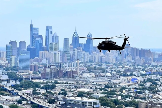 A UH-60 Black Hawk helicopter from the Pennsylvania National Guard’s 28th Expeditionary Combat Aviation Brigade flies over Philadelphia during a Dense Urban Terrain exercise. The exercise, which ran from July 25 to 29, was conducted by Task Force 46, a 600-personnel chemical, biological, radiological or nuclear (CBRN) response element comprising National Guard units from states across the country. (Courtesy photo)