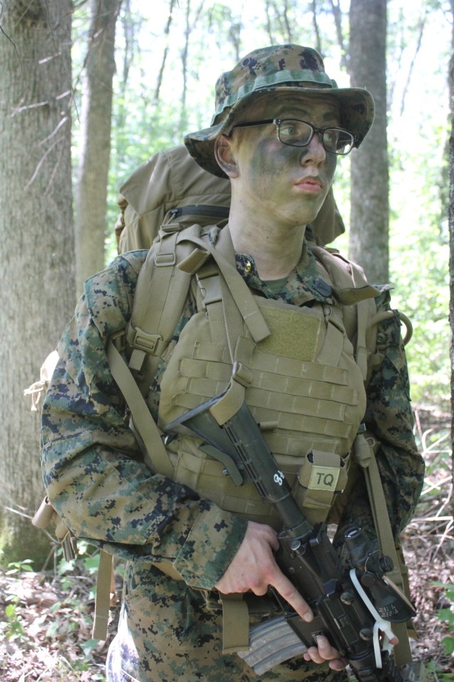 Hospital Corpsman 1st Class Douglas Dembroge, 2nd Battalion, 24th Marines, conducts a contact patrol with other Corpsmen and Marines on July 22, 2022, during training on North Post at Fort McCoy, Wis. The 2/24 is an infantry battalion based out of...