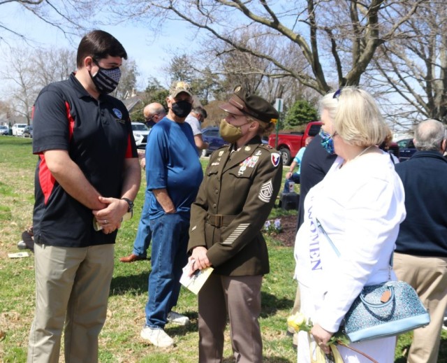 U.S. Army Communications-Electronics Command Sgt. Maj. Kristie Brady (center) chats with Havre de Grace City Council members Jason Robertson (left) and Casi Boyer (right) before a dedication ceremony for the “Votes for Women” historical marker in Havre de Grace’s Tydings Park March 27, 2021.