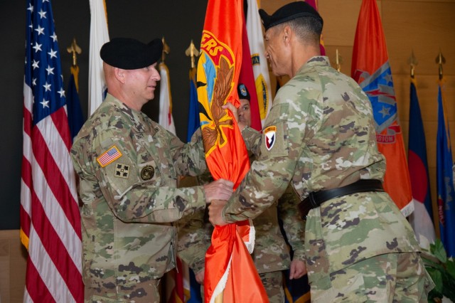 Command Sgt. Maj. Michael Conaty assumes responsibility as the senior enlisted advisor to Maj. Gen. Robert Edmonson, commanding general of the U.S. Army Communications-Electronics Command and APG senior commander, during a change of responsibility ceremony at the Myer Auditorium Aug. 2, 2022. 