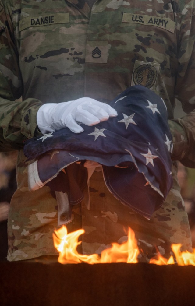 Freedom Academy delegates perform a flag retirement ceremony