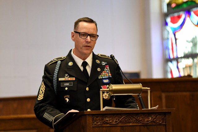 Combined Arms Center-Training Senior Enlisted Advisor Sergeant Maj. Thomas Conn speaks during his retirement ceremony at the Pioneer Chapel, Fort Leavenworth, Kan. July 29, 2022. Because Conn served as a Command Sgt. Maj. in previous assignments, he retired with that rank. Photo by Tisha Swart-Entwistle, Combined Arms Center-Public Affairs.