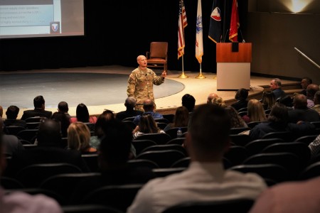 Gen. Ed Daly, Army Materiel Command commander, discusses Supply Chain Optimization with members of the U.S. Army Tank-automotive and Armaments Command’s Integrated Logistics Support Center gathered at Detroit Arsenal Aug. 2.                      