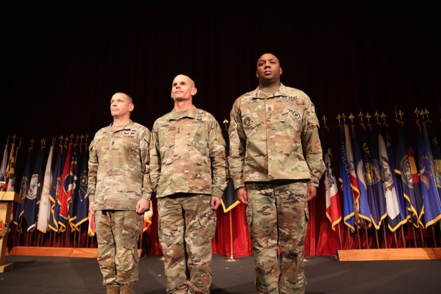 U.S. Army Installation and Management Commanding General Lt. Gen. Omar Jones, center, stands with former IMCOM Command Sergeant Major Joe Ulloth, left, and new Command Sergeant Major Jason Copeland during a Change of Responsibility Ceremony Aug. 5, 2022, at the Fort Sam Houston Theater at JBSA-Fort Sam Houston, Texas. 


