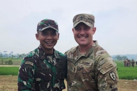 Maj. Arief Widyanto, Tentara Nasional Indonesia (TNI) poses for a photo after reuniting with his former Ranger Instructor, 1st Sgt. Dan Alexander during Super Garuda Shield in Bataraja, Indonesia on Aug. 3, 2022. Super Garuda Shield, a part of Operation Pathways and a longstanding annual, bilateral military exercise conducted between the U.S. military and Indonesia National Armed Forces, reinforces the U.S. commitments to our allies, and regional partners, joint readiness, and the interoperability to fight and win together.