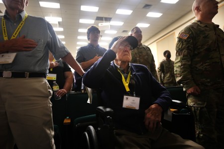 106-year-old World War II veteran Al Klugiewicz salutes during the playing of the national anthem at a room commemoration ceremony at Haszard Auditorium Aug. 5, 2022. Klugiewicz and four other veterans from the old 83rd “Thunderbolt” Infantry Division joined members of 83rd Army Reserve Readiness Training Center for the ceremony as part of the 83rd Association’s 75th annual reunion.