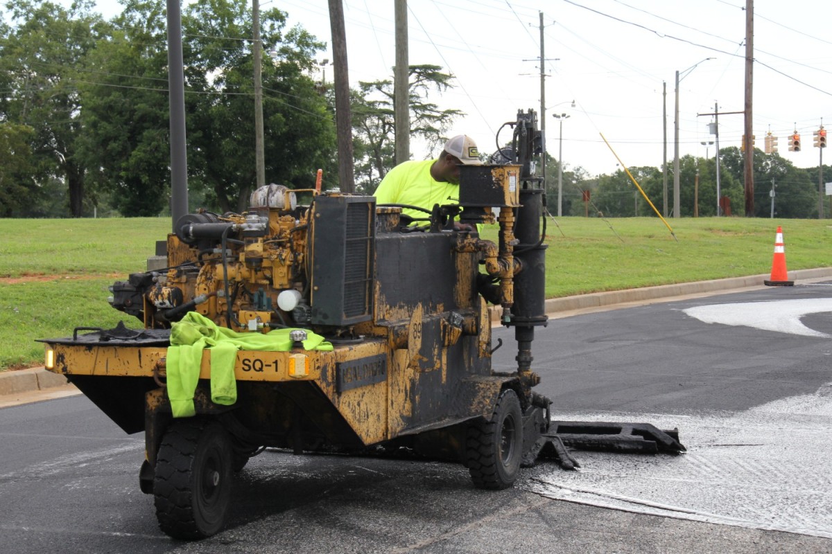 Fort Rucker Commissary parking lot receives new coating, fresh paint
