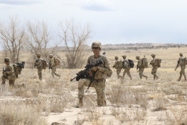 A soldier assigned to C Troop, 3rd Squadron, 61st Cavalry Regiment, 2nd Stryker Brigade, 4th Infantry Division, provides security for their formation while conducting movement to an observation post during Operation Steel Eagle on Fort Carson, Colo., Mar. 29, 2022.  Operation Steel Eagle is a brigade-wide exercise designed to integrate maneuver forces, artillery fires, and intelligence collection. U.S. Army photo by Maj. Jason Elmore.