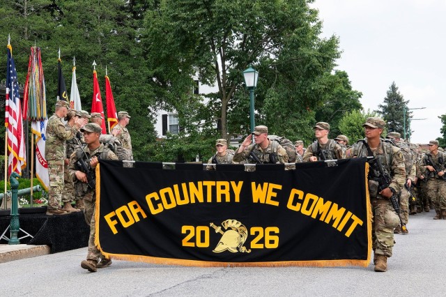 Members of the U.S. Military Academy Class of 2026 display their motto as they complete the final leg of a 12-mile road march signifying the successful completion of Cadet Basic Training at West Point, N.Y., Aug. 8, 2022.