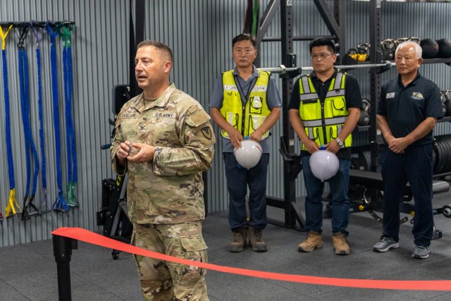 U.S. Army Garrison Daegu Commander Brian P. Schoellhorn offers his thanks to the team responsible for renovating the Wall Fitness Center at Camp Henry, Republic of Korea, Aug. 5, 2022. The upgraded fitness center now has an area dedicated to functional fitness to help Soldiers prepare for their Army Combat Fitness Tests.
