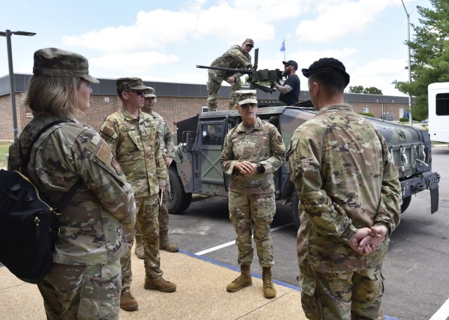 Air Force Maj. Gen. Michele Edmondson, Second Air Force commander at Keesler Air Force Base, Mississippi, speaks with Air Force Staff Sgt. Matthew Lazo, a combat arms heavy weapons instructor with the 343rd Training Squadron detachment here, during a tour of Fort Leonard Wood’s Air Force footprint Wednesday. Edmondson visited the installation this week to witness the Air Force training missions, hear from the cadre and learn more about the unique joint-service partnerships here. 